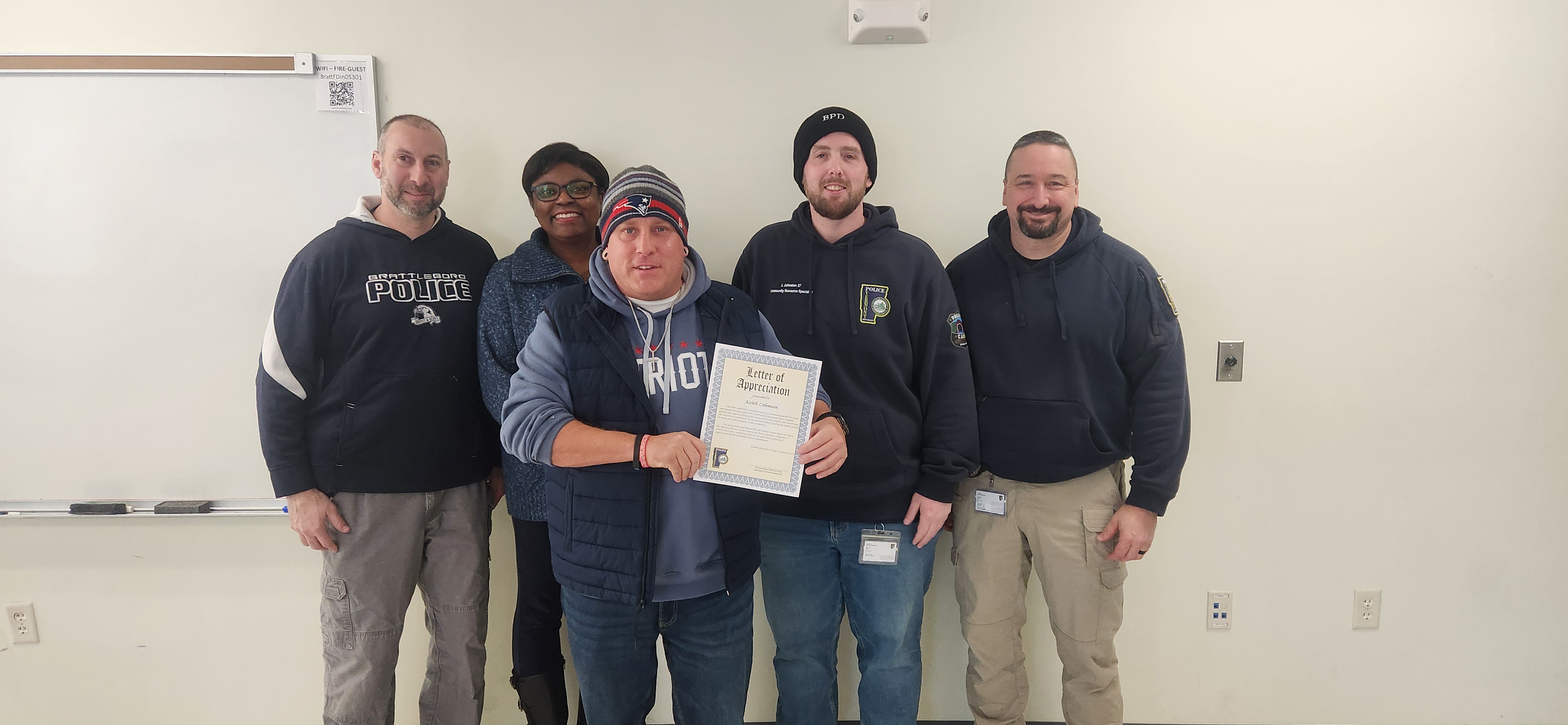 A photo of Keith Coleman accepting the Community Partner Award.